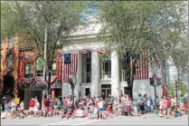  ??  ?? Crowds gathered for the parade during the 10th annual Saratoga’s All-American Celebratio­n on Tuesday in downtown Saratoga Springs.