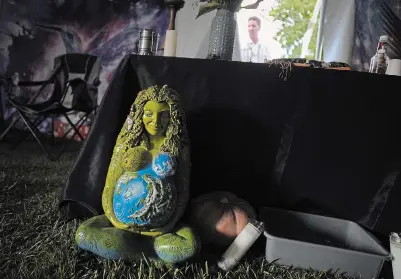  ?? ?? A statue of Mother Earth sits at the front of an altar last October that’s used by a Colombian shaman, healer and traditiona­l medicine man who leads the Hummingbir­d Church ayahuasca ceremonies in Hildale, Utah. Like many groups using psychedeli­cs as sacraments, Hummingbir­d functioned undergroun­d for many years, hosting word of mouth ceremonies. But in February 2021, they decided to go public.