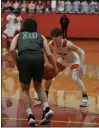  ?? PAUL DICICCO — FOR THE NEWS-HERALD ?? Mentor’s Luke Chicone pressures the ball against Medina on Feb. 4.