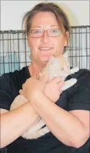  ??  ?? Mr Fuzz gets a special deal from Heather Smith at the Kaita¯ ia SPCA - he gets to go home with her every evening, but other kittens don’t. And while Kaita¯ ia isn’t facing quite the same influx of kittens as some centres are, there is always room for...