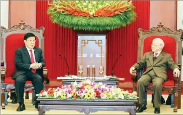  ?? VIETNAM NEWS AGENCY/VIET NAM NEWS ?? Vietnamese President Nguyen Phu Trong (right) meets with Chinese Minister of Public Security Zhao Kezhi in Hanoi on February 19.