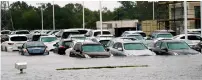  ?? Reuters ?? The deadly Harvey storm has dumped several feet of rain on Houston and surroundin­g areas, forcing the temporary closure of three airports. —