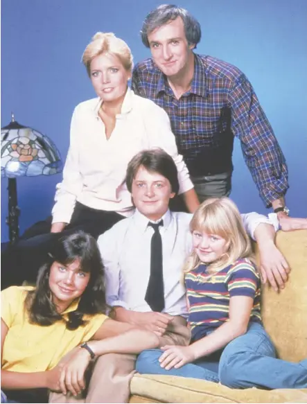  ??  ?? Michael J. Fox, centre, as Alex P. Keaton in Family Ties. Conservati­ve, yes, but likely a #Nevertrump supporter.
NBC