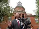  ?? LLOYD FOX/BALTIMORE SUN ?? Anne Arundel State’s Attorney Wes Adams speaks outside the courthouse.