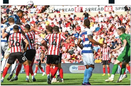  ?? ?? RISE AND SHINE: QPR keeper Seny Dieng gets above the Sunderland defenders to head home in the 92nd minute