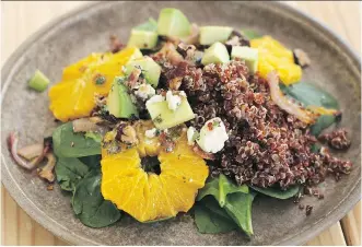  ?? MATTHEW MEAD/ THE ASSOCIATED PRESS ?? A new recipe for Spinach Salad with Roasted Oranges and Shallots boosts the nutrient content, while eliminatin­g some of the harmful and heavy fat.