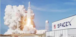  ??  ?? A Falcon 9 SpaceX heavy rocket lifts off from pad 39A at the Kennedy Space Center in Cape Canaveral, Fla., Tuesday, Feb. 6, 2018. (AP)