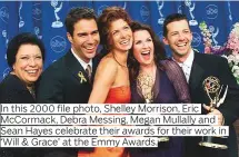  ??  ?? In this 2000 file photo, Shelley Morrison, Eric
McCormack, Debra Messing, Megan Mullally and
Sean Hayes celebrate their awards for their work in ‘Will & Grace’ at the Emmy Awards.