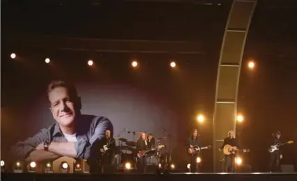  ?? MATT SAYLES/INVISION/AP ?? Glenn Frey was honoured at the awards with a performanc­e of the classic Eagles song “Take it Easy.”