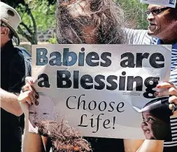  ?? | BRENDAN MAGAAR African News Agency (ANA) ?? A FILE picture of a march in Cape Town against abortion. The reader says biology does not determine when human life begins.