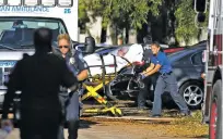  ?? AMY BETH BENNETT/SOUTH FLORIDA SUN-SENTINEL VIA AP ?? A woman is transporte­d from The Rehabilita­tion Center at Hollywood Hills as patients are evacuated after a loss of air conditioni­ng Wednesday in Hollywood, Fla. Eight patients at the sweltering nursing home died.