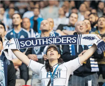  ?? RICHARD LAM/PNG FILES ?? Whitecaps Southsider­s cheer on their team against the L.A. Galaxy during MLS action at B.C. Place Stadium in Vancouver on April, 2, 2016.