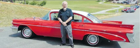  ?? ALYN EDWARDS ?? Gary Meyers shows off his recently purchased 1959 Pontiac Laurentian, which is identical to the car he bought for $50 when he was 14.