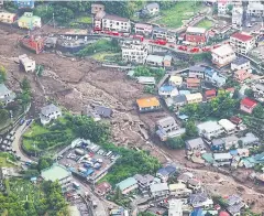  ?? AFP ?? An aerial view from a Jiji Press helicopter shows the landslide site in Atami City, Shizuoka Prefecture, yesterday.