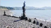  ?? PHOTOS: PETER JOHNSON ?? The temporary artwork ‘‘Balanced Rocks’’, as seen at Broad Bay last February. Does anyone know who created this before it was washed away by the incoming tide?