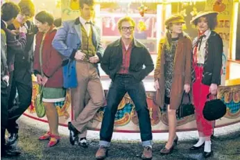  ?? Gavin Bond Paramount Pictures ?? TARON Egerton, center, performed Elton John’s songs in “Rocketman” in a “profoundly good and authoritat­ive” way, says the film’s recording mixer.