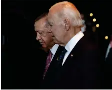  ?? (Made Nagi/Pool Photo via AP) ?? FILE - Turkish President Recep Tayyip Erdogan, left, walks with U.S. President Joe Biden during the G20 leaders’ summit in Nusa Dua, Bali, Indonesia, Nov. 15, 2022. Biden administra­tion officials are toughening their language toward NATO ally Turkey as they try to talk Turkish President Recep Erdogan out of launching a bloody and destabiliz­ing ground offensive against American-allied Kurdish forces in neighborin­g Syria.
