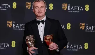  ?? ?? Christophe­r Nolan, réalisateu­r du film "Oppenheime­r" aux Bafta, à Londres, dimanche 18 février 2024.
