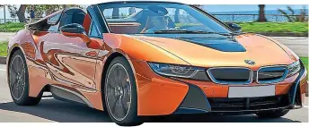  ??  ?? Open-top: BMW’s i8 Roadster has a 33-mile electric-only ‘zero-emissions’ range