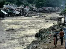  ?? News Agency (ANA) | THEO JEPTHA African ?? RIVERS overflowed and hundreds of shacks were damaged in the recent Durban floods. The situation resulted in the declaratio­n of a National State of Disaster.