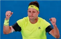  ?? REUTERS ?? Match of his life: Sandgren celebrates