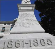  ?? BOB ANDRES / BANDRES@AJC.COM ?? The monument was erected outside of what was then the DeKalb County Courthouse in 1908. It is a 30-foottall obelisk with an inscriptio­n at its base that praises Confederat­e soldiers because they “were of a covenant keeping race.” A coalition of civil rights group is looking to move the monument.