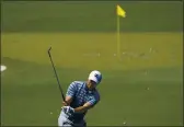  ?? DAVID J. PHILLIP — THE ASSOCIATED PRESS ?? Jordan Spieth works on the range during a practice day for the Masters on Monday in Augusta, Ga.