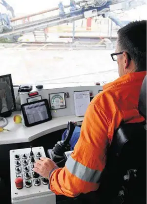  ??  ?? DIGGING IN: A drill operator at work on the project to link Caithness and Moray