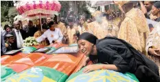  ?? | Reuters ?? A WOMAN mourns during the burial ceremony of the Ethiopian plane crash victims at the Holy Trinity Cathedral Orthodox church in Addis Ababa, Ethiopia, yesterday.