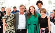  ?? — AP/AFP photos ?? In this May 18, 2017 file photo, actor Michelle Williams, from left, director Todd Haynes, and actors Julianne Moore, Jaden Michael and Millicent Simmonds pose for photograph­ers during the photo call for the film ‘Wonderstru­ck’ at the 70th internatio­nal film festival, Cannes, southern France.