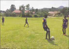  ?? Contribute­d photos ?? Futbollers at the Red Rocks — Acts of Hope Foundation in Musanze, Rwanda, get in some practice.
