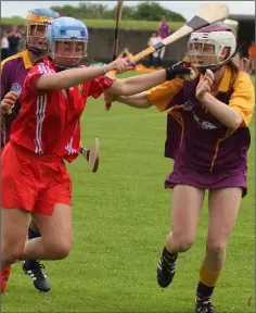  ??  ?? Lettie Whelan challenges Cork’s Michelle Fitzpatric­k.