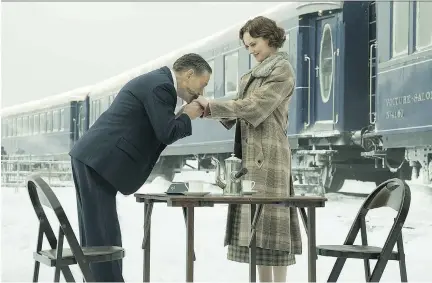  ??  ?? Kenneth Branagh and Daisy Ridley shown in a scene from Murder on the Orient Express, another film interpreta­tion of the Agatha Christie novel.