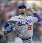  ?? JEFF CHIU – THE ASSOCIATED PRESS ?? Dodgers starter Andrew Heaney struck out seven in four innings Monday night against San Francisco.