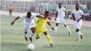  ??  ?? Christ Madaki (right) of Pillars and Joshua Obaje (left) of Plateau United during their match in the Nigeria Profession­al Football League last season