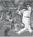  ?? STEVEN SENNE/AP ?? The Red Sox’s Alex Verdugo hits into a fielder’s choice, driving home Enrique Hernandez in the fourth inning against the Astros on Monday night.