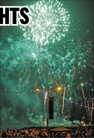  ??  ?? The fireworks on Wexford Quayfront on the opening night are a festival fringe highlight; above, left: flashback to 2011 when dancers April Dowdall, Gavin Byrne and ‘butler’ Patrick O’Connor were rehearsing at Curracloe Beach ahead of their performanc­e...