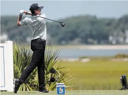  ?? GERRY BROOME THE ASSOCIATED PRESS ?? Mackenzie Hughes of Dundas drives off the 18th tee, during the second round of the RBC Heritage, in Hilton Head Island, S.C. Friday.