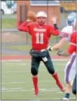  ?? Photo by John Gleeson ?? Bristol junior QB Trevor Leone looks for an open receiver in win over Williams Valley.