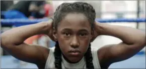  ?? OSCILLOSCO­PE VIA AP ?? This image released by Oscillosco­pe shows Royalty Hightower in a scene from “The Fits,” a film about an 11-year-old girl who learns about gender and identity through dance.