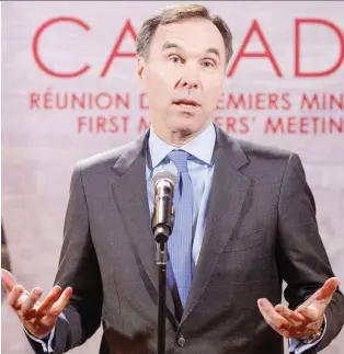  ?? RYAN REMIORZ/THE CANADIAN PRESS ?? Finance Minister Bill Morneau is promoting rosy hiring figures, however wage growth and the youth participat­ion rate in the labour force are another story, says Kevin Carmichael.