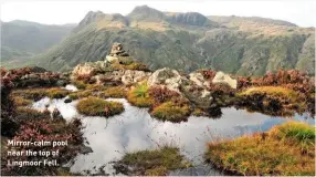  ?? ?? Mirror-calm pool near the top of Lingmoor Fell.