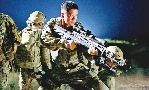  ??  ?? Wu Jing, also known as Jackie Wu, gets into the thick of action in the current blockbuste­r ‘Wolf Warrior 2’.