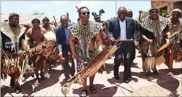  ?? Picture: Bongani Mbatha/African News Agency/ANA ?? GETTING IN STEP: Ace Magashule, behind King Goodwill Zwelithini (centre), and ANC president Cyril Ramaphosa join in traditiona­l song and dance with the amabutho at Osuthu royal kraal in KZN.