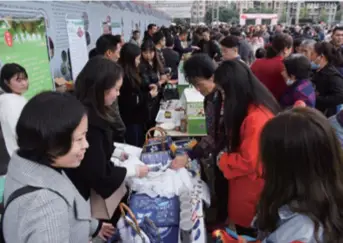  ??  ?? Products from an underdevel­oped mountainou­s region on sale at a poverty alleviatio­n event in Luzhou, Sichuan Province in southwest China, on October 17