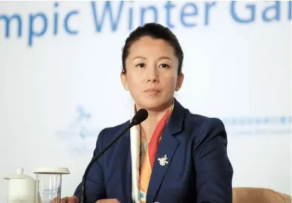  ??  ?? Former Chinese short track speed skater Yang Yang attends a press conference in Beijing. — AFP