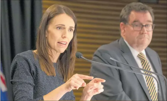  ??  ?? Prime Minister Jacinda Ardern announcing the Government will put the country into lockdown to try to stop the spread of Covid-19 coronaviru­s.