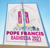  ?? ZAID AL-OBEIDI/GETTY-AFP ?? A sign welcomes the pope Sunday outside a Catholic church in Iraq. The March 5-8 trip is expected to provide a spiritual boost to Iraq’s Christians.