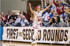  ?? DOUG MCSCHOOLER — THE ASSOCIATED PRESS ?? Indiana guard Sara Scalia (14) reacts after scoring a 3-point field goal during the second half of a first-round college basketball game against Fairfield in the NCAA Tournament, Saturday, March 23, 2024, in Bloomingto­n, Ind.