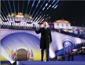  ?? EVAN VUCCI-ASSOCIATED PRESS ?? President Joe Biden arrives to deliver a speech marking the one-year anniversar­y of the Russian invasion of Ukraine, Tuesday at the Royal Castle Gardens in Warsaw.